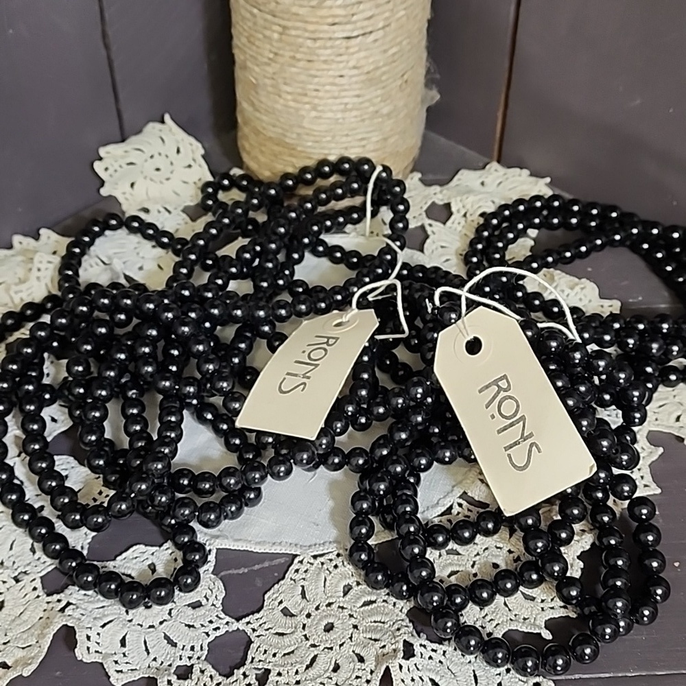 Ron's black strand pearl plastic beads